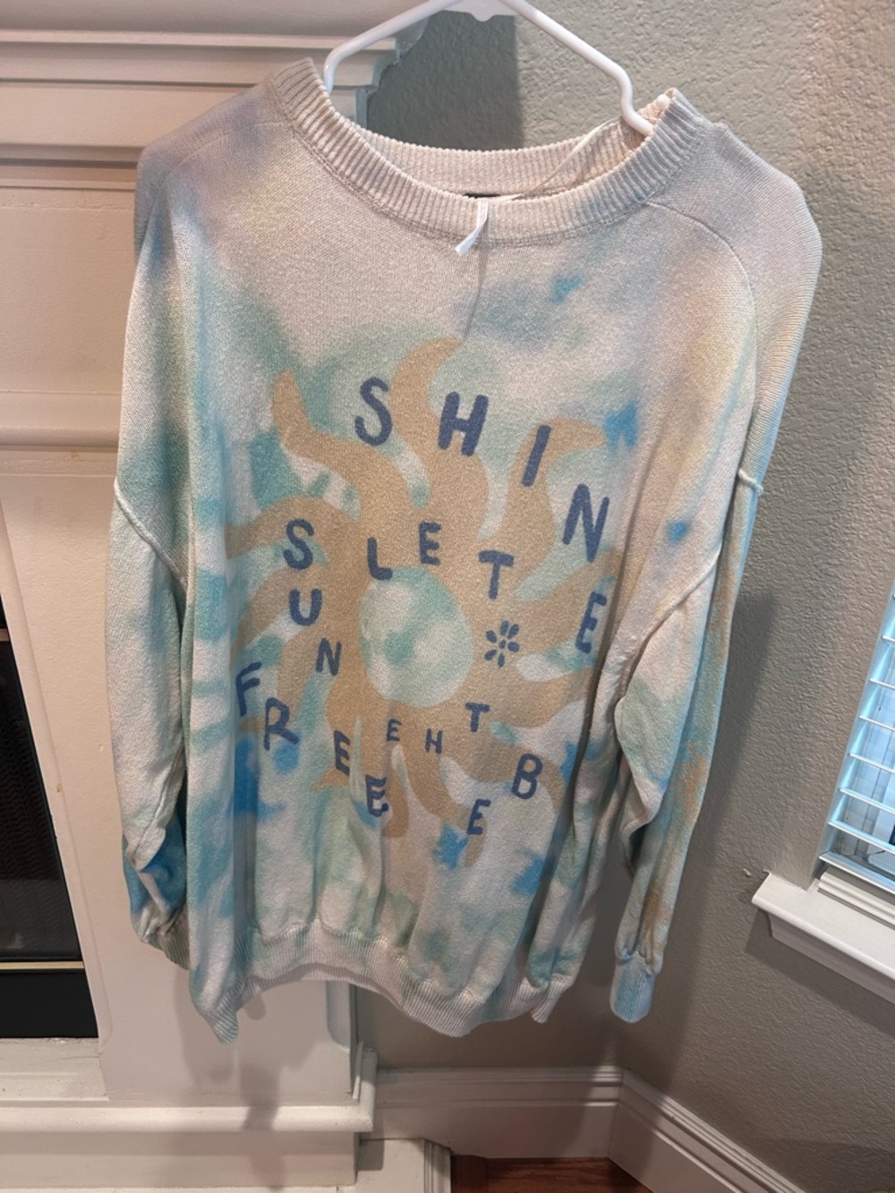 Free People cosmo graphic pullover- sunny sky size small